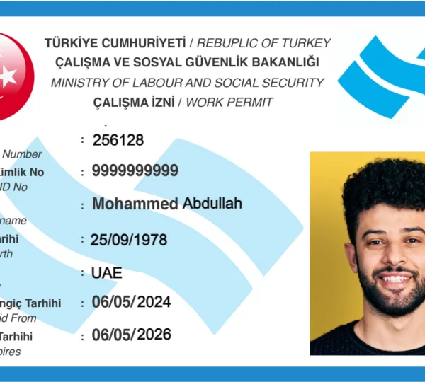 a man with a blue and white Turkey work visa card